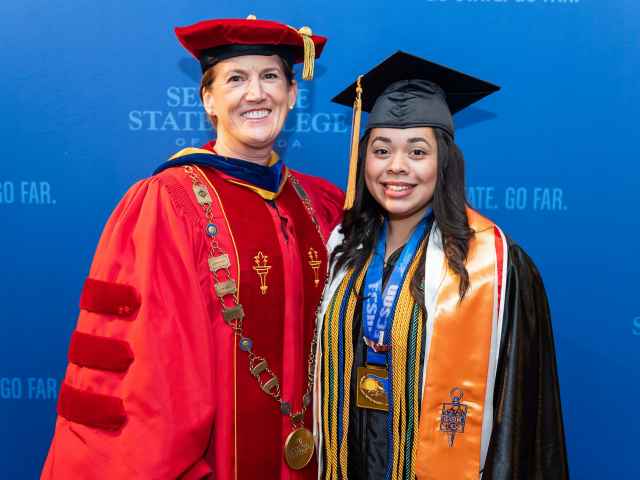 Seminole State President Dr. Georgia L. Lorenz, left, and Student Government Association President of the Altamonte Springs Campus Yesmene Chikha. Chikha presented the student challenge during the College’s May 2 commencement at the Addition Financial Arena at University of Central Florida.