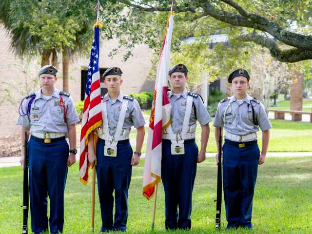 ROTC members stand at attention on Seminole State's Sanford/Lake Mary Campus