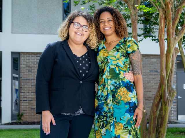 Two women standing together for a picture as the 2019 JKC scholarship winners.