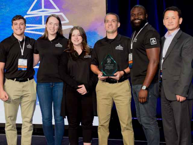 L-R: DBIA Chairman William G. Hasbrook Jr., Seminole State team members Jeffrey Stout, Michael Miller, Windy Pierre-Louis, Tamara Noftsinger and Tiffany Theodore, Construction Professor/Program Manager Dr. Tan Qu and DBIA Executive Director Lisa Washington.