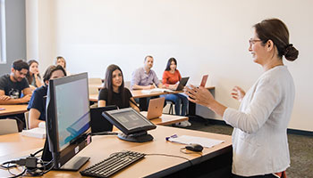 professor teaching a course in a classroom