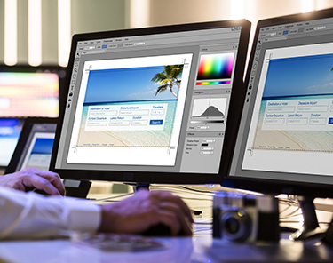 Two computer monitors showing imaging software
