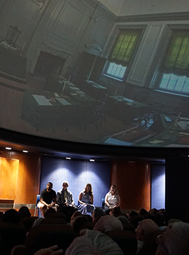 A group of people in the Emil Buehler Perpetual Trust Planetarium at Seminole State College of Floria watching the UndertheDome program