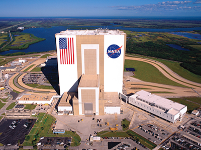USA and NASA symbols on the outside building at the Kennedy Space Center in Cape Canaveral Florida