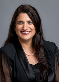 Dianna Campbell wearing a black blouse