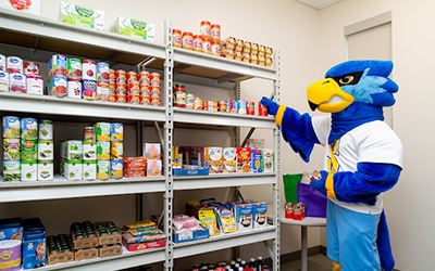 Rally with Student in Raiders Pantry