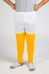 A person standing in mesh shorts and yellow leggings